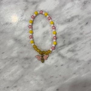 Kids size, pink and yellow bracelet